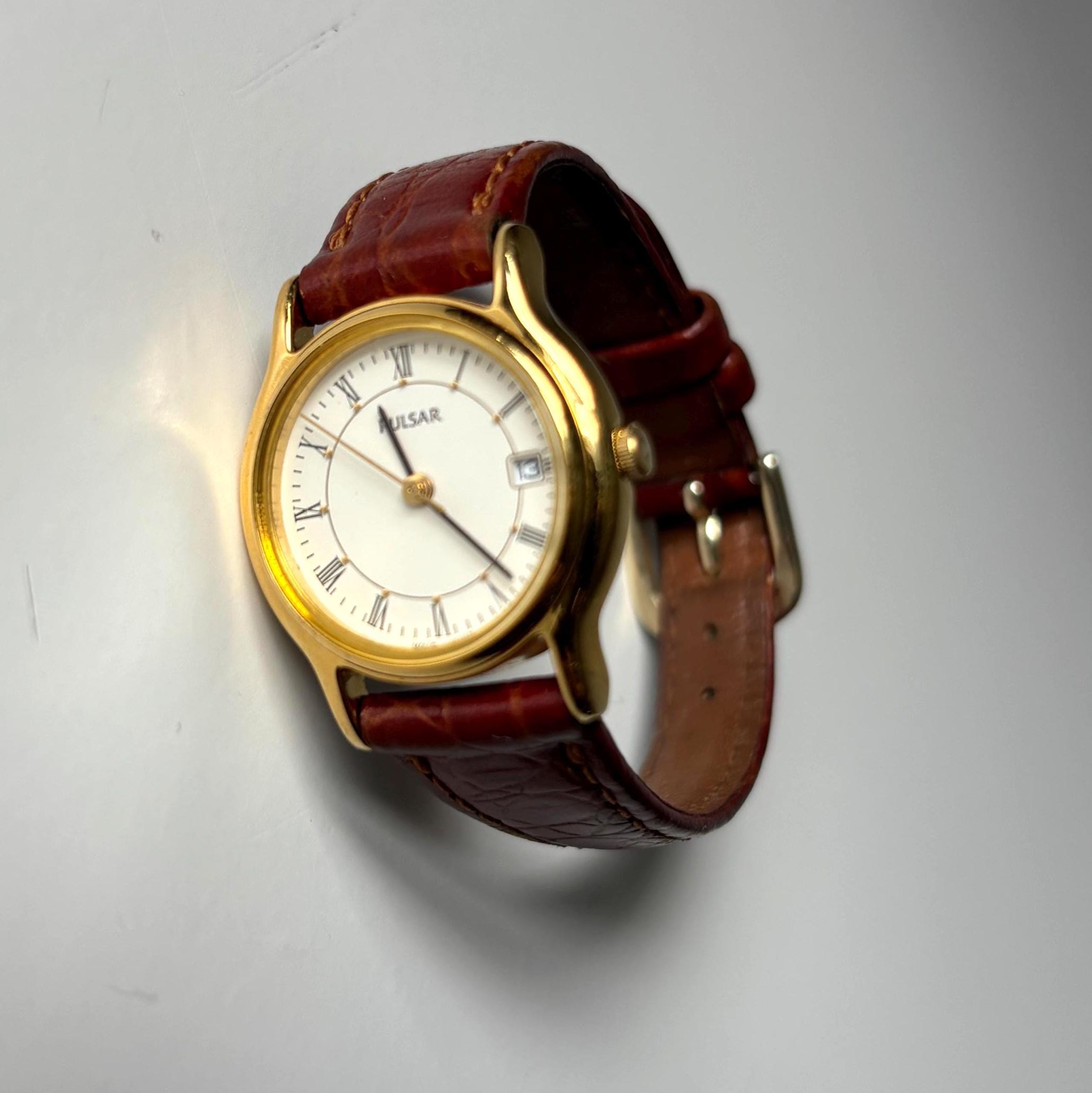 Vintage Pulsar V782-X088 Ladies Quartz Watch Working Roman Numeral Dial Date Display January 1996
