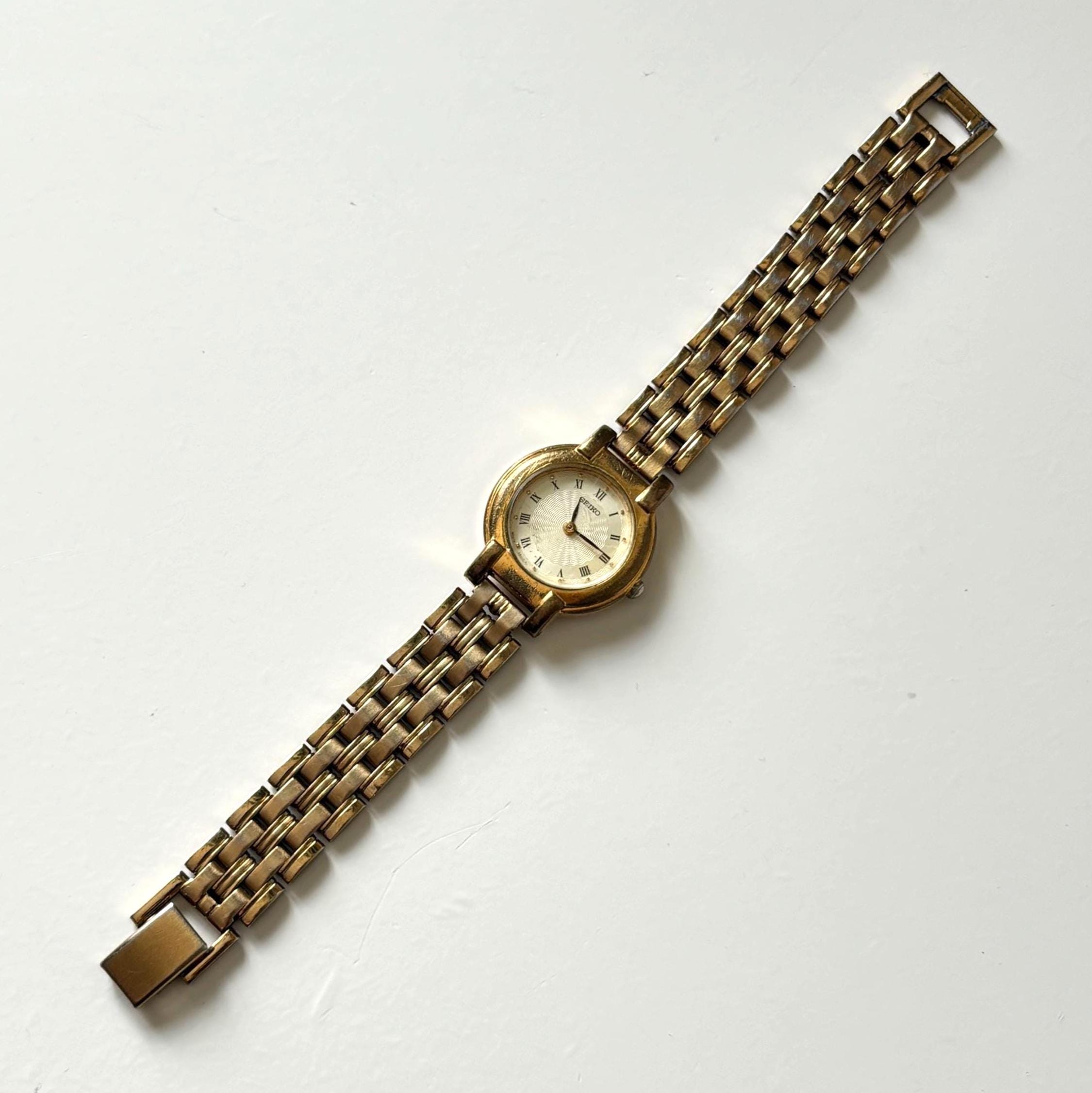 Vintage Seiko Ladies Quartz Watch Working Gold Tone Bracelet Roman Numeral Dial Dress Watch