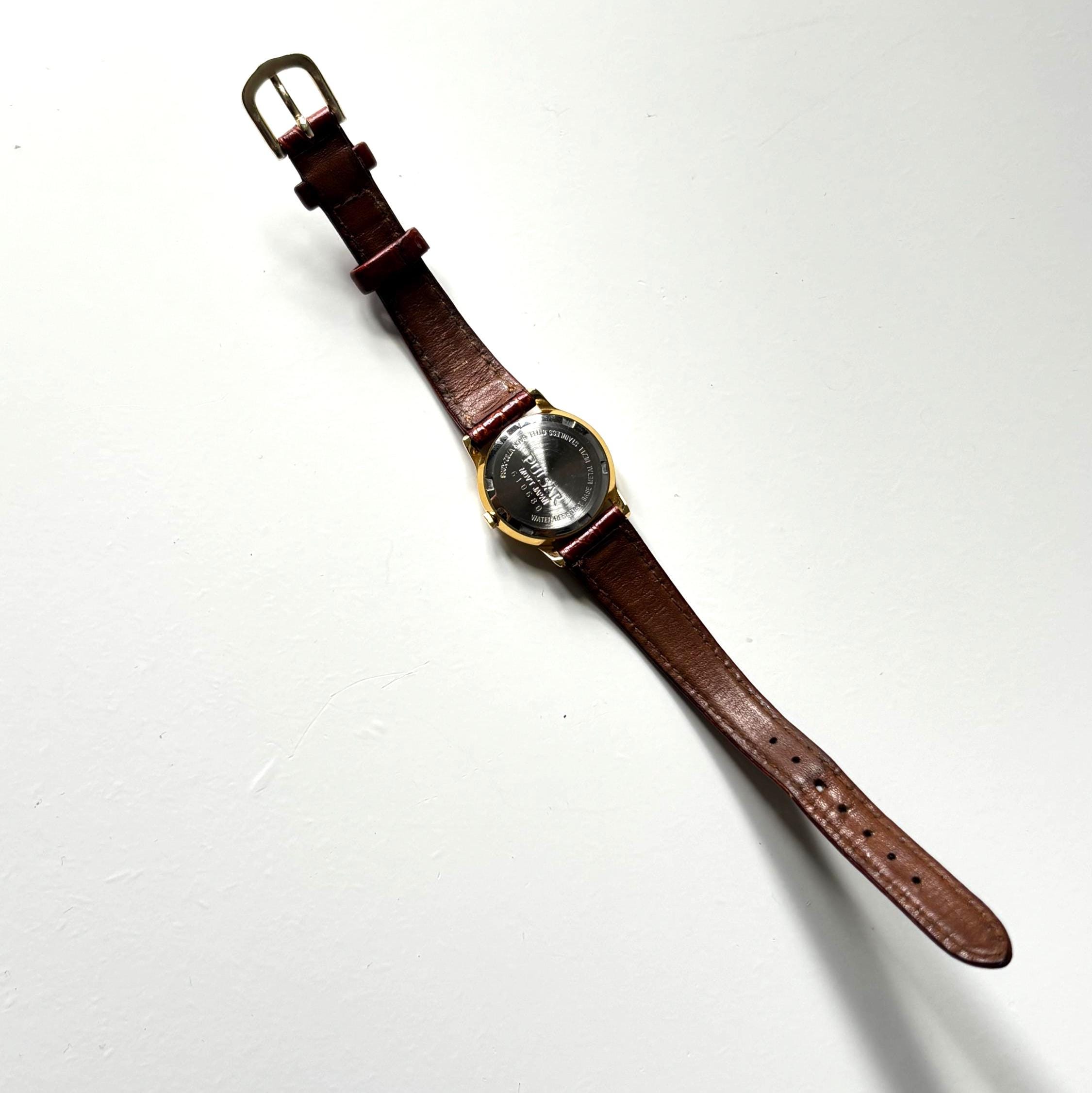 Vintage Pulsar V782-X088 Ladies Quartz Watch Working Roman Numeral Dial Date Display January 1996
