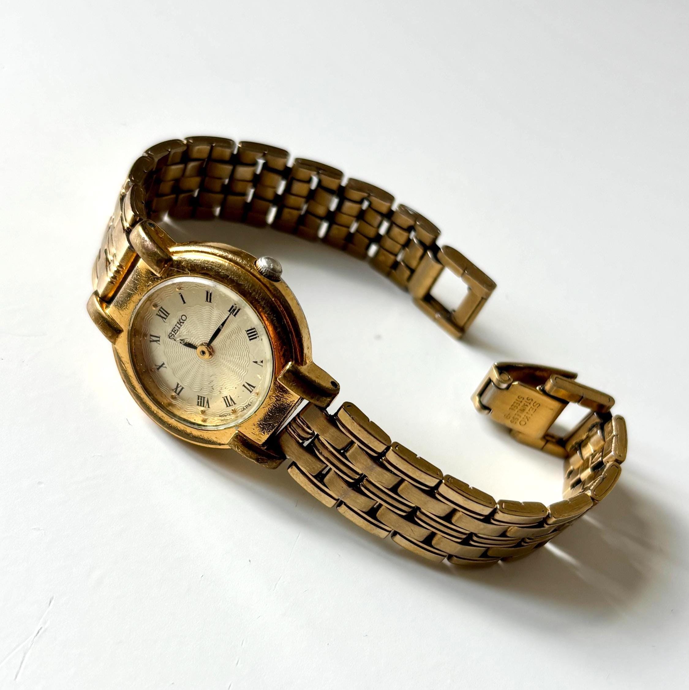 Vintage Seiko Ladies Quartz Watch Working Gold Tone Bracelet Roman Numeral Dial Dress Watch