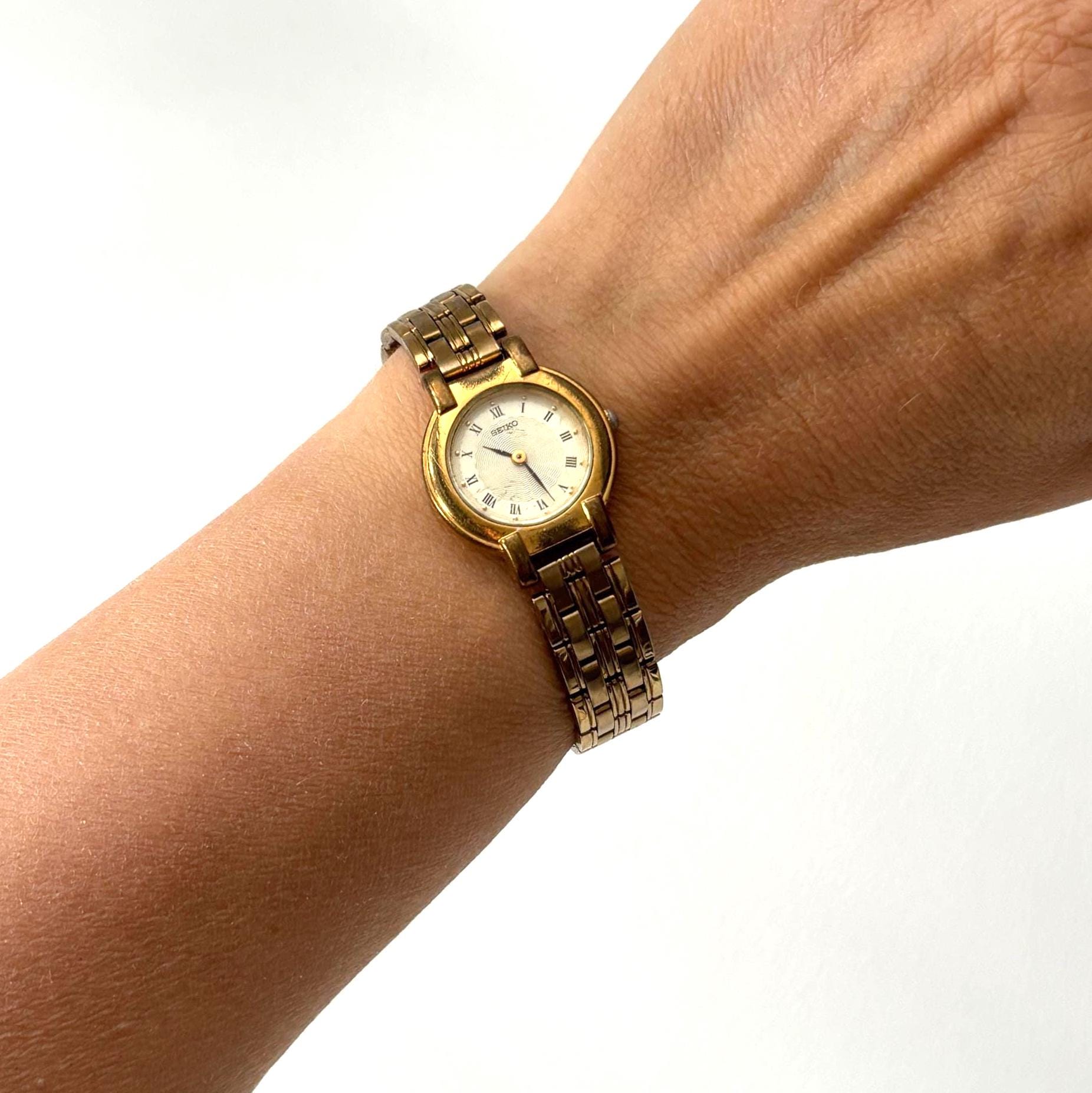 Vintage Seiko Ladies Quartz Watch Working Gold Tone Bracelet Roman Numeral Dial Dress Watch
