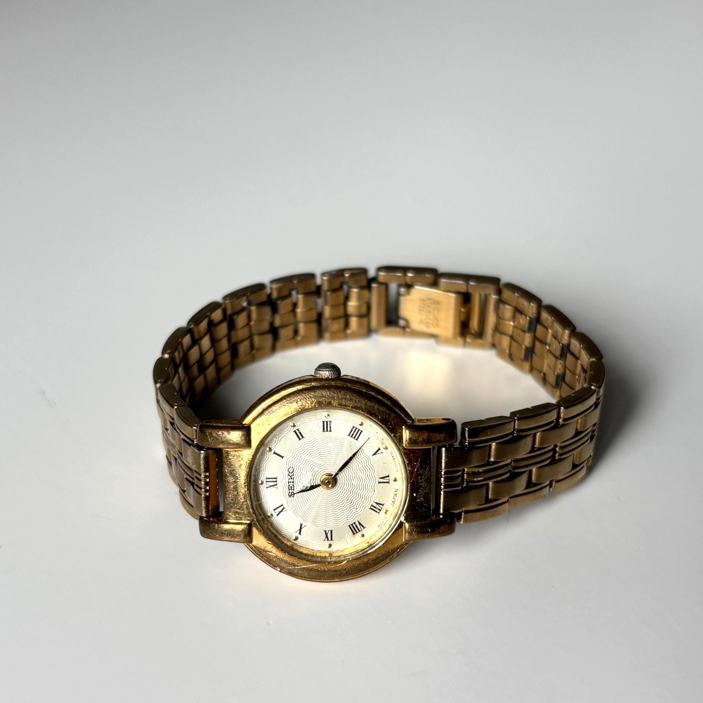 Vintage Seiko Ladies Quartz Watch Working Gold Tone Bracelet Roman Numeral Dial Dress Watch