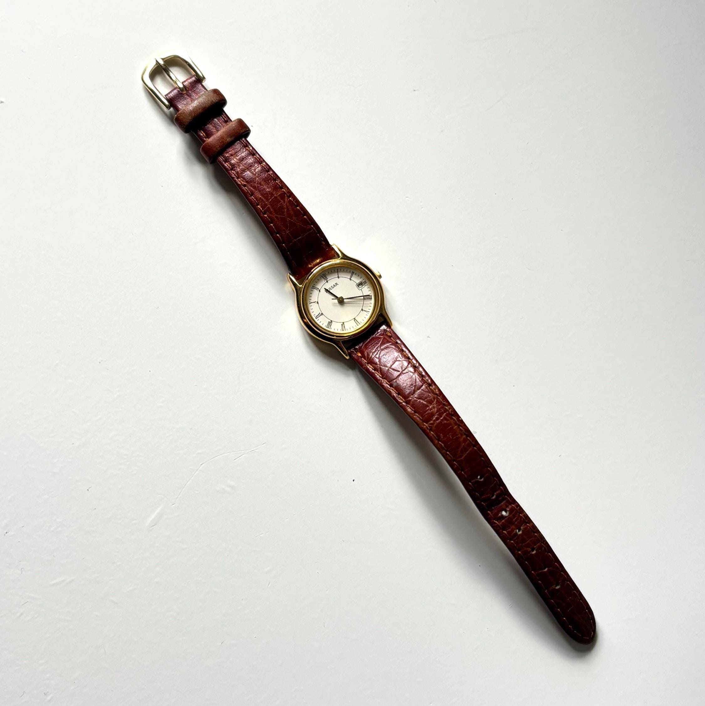 Vintage Pulsar V782-X088 Ladies Quartz Watch Working Roman Numeral Dial Date Display January 1996