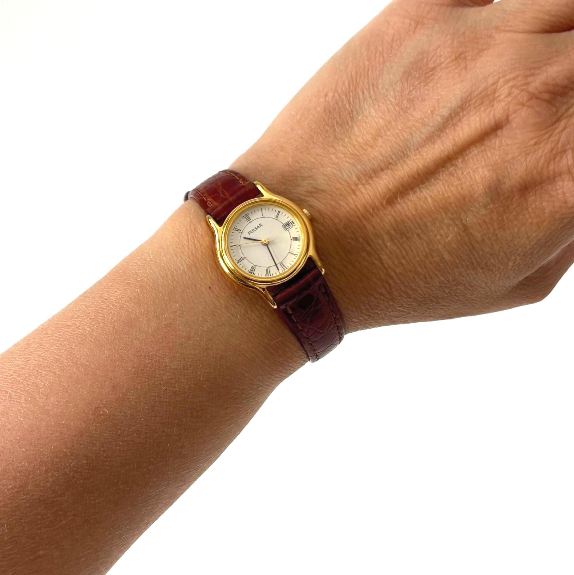 Vintage Pulsar V782-X088 Ladies Quartz Watch Working Roman Numeral Dial Date Display January 1996
