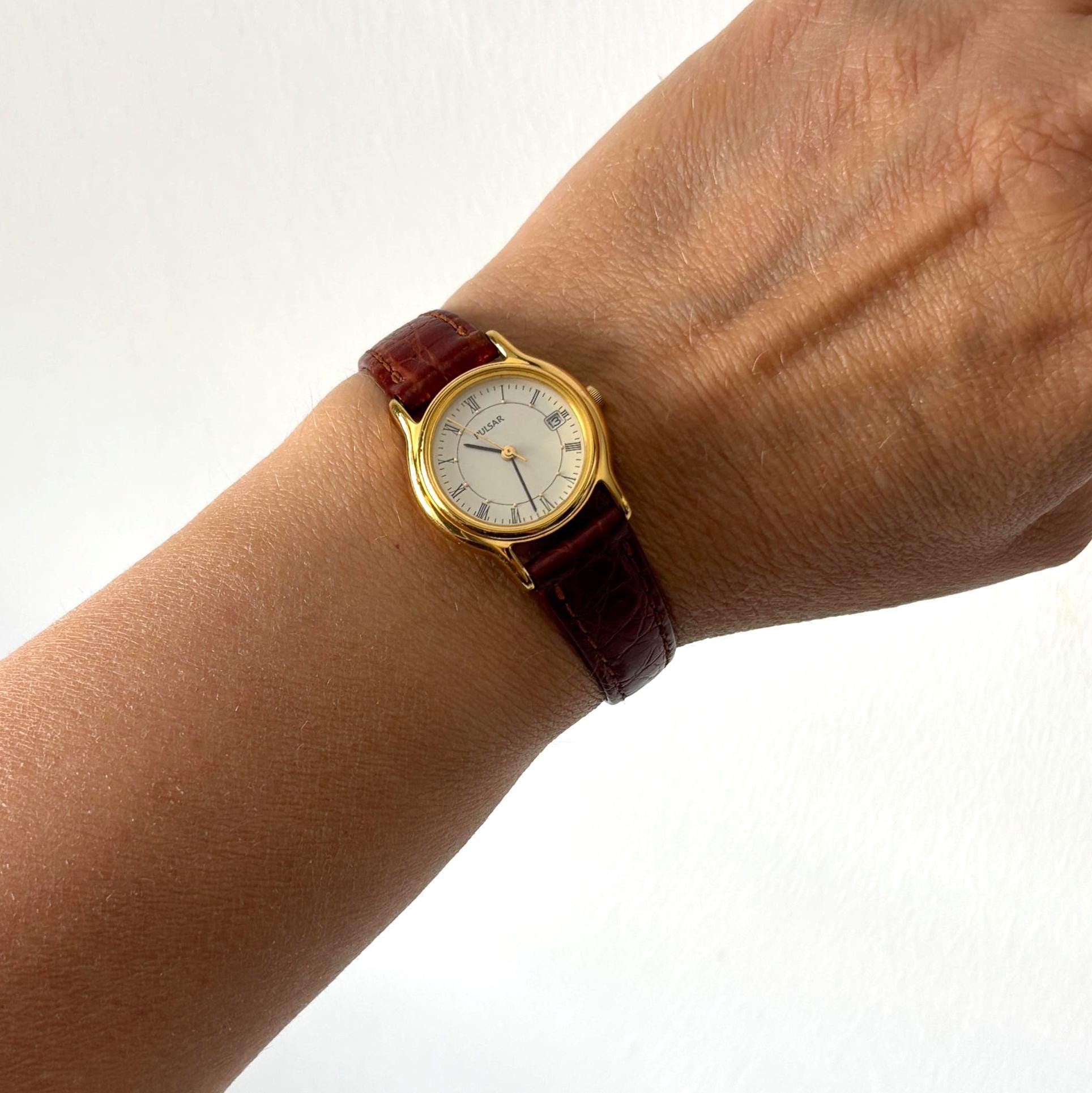 Vintage Pulsar V782-X088 Ladies Quartz Watch Working Roman Numeral Dial Date Display January 1996