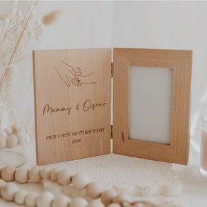 Our first Mother’s Day folding book style photo frame engraved holding hands mummy and me