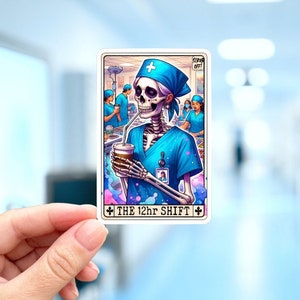 May include: A tarot card with a skeleton wearing a blue surgical scrub and a blue surgical cap. The skeleton is holding a cup of coffee and has a straw in its mouth. The card is titled "The 12hr Shift".
