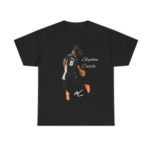May include: Black t-shirt featuring a basketball player in action, wearing a black and white uniform with the number 5. The text "Stephon Castle" is printed on the shirt.
