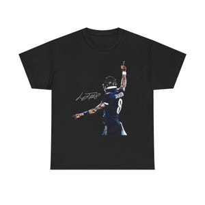 May include: Black t-shirt featuring a graphic of a football player in a uniform with the number 8, raising his arm. The shirt includes the player's signature and the name "Jackson".