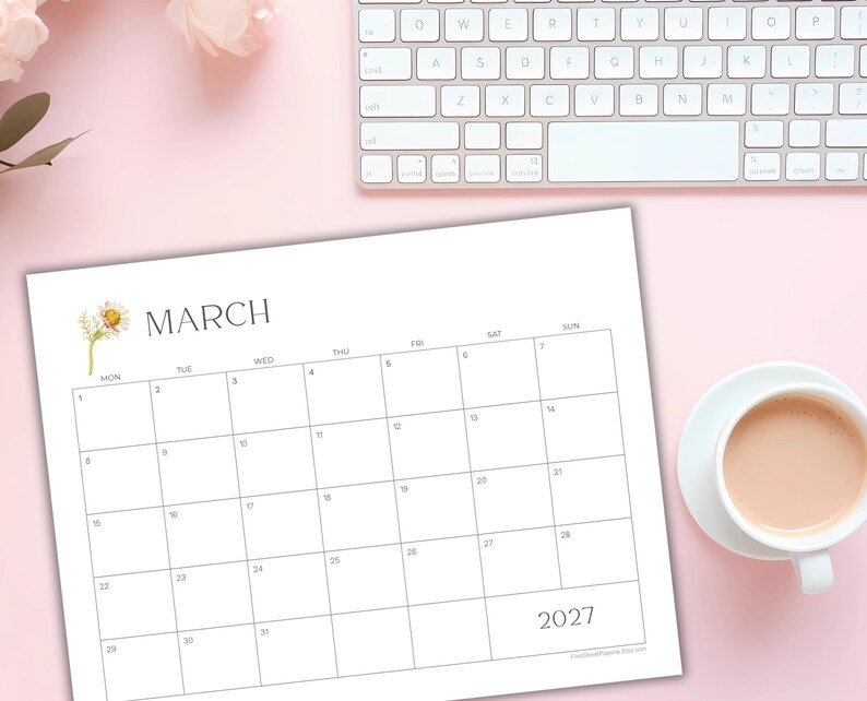 May include: A white paper calendar for March 2027 featuring a grid layout with black text and a small watercolor illustration of a daisy flower. The calendar includes days of the week and numbered dates from one to thirty-one in a clean design.