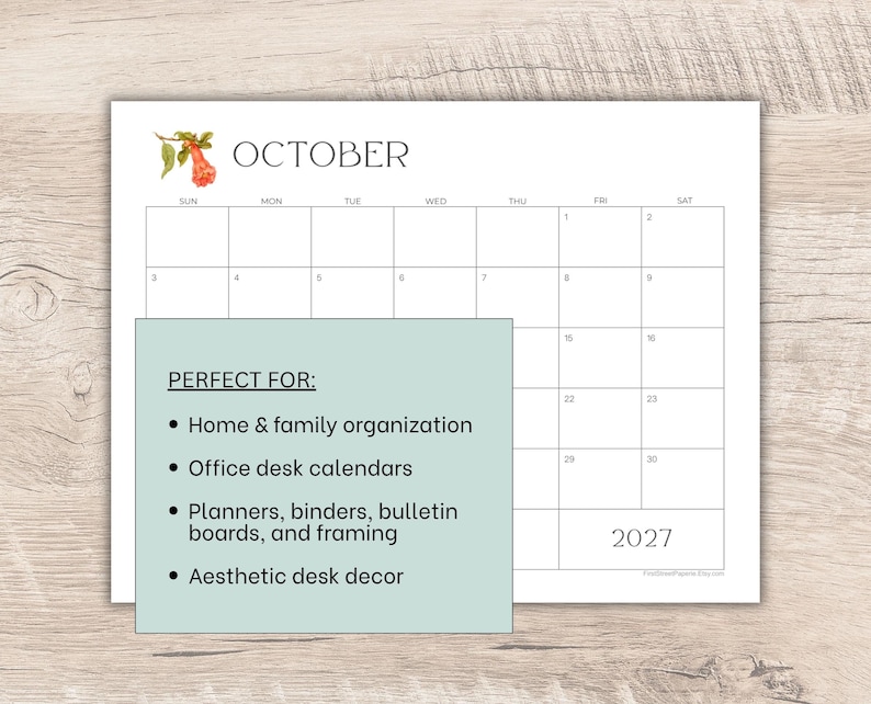May include: A white paper calendar page for October 2027 featuring a small botanical illustration of a pomegranate in the top left corner. A light green overlay box displays black text listing uses including home organization and office decor.