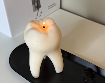 Vela de diente: Velas temáticas