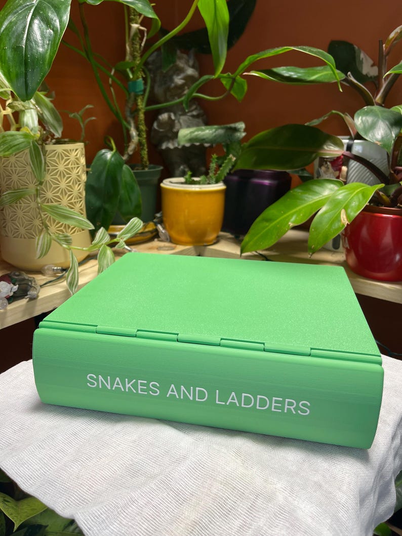 Playbook'D Ormar och stegar - Spel med vikbokstema bild 1