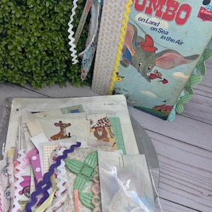 Dumbo Junk Journal – Vintage Disney Altered Book – Handmade Journal with Charm & Ephemera – On Land, on Sea, on Air