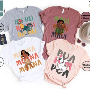 four t-shirts with different designs, including characters from the Disney movie "Moana" and a person wearing a hat.