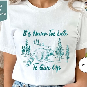 It's Never Too Late To Give Up, Vintage Drawing T-Shirt, Cowboy Meme T-Shirt, Sarcastic T-Shirt, Raccoon Meme Tee