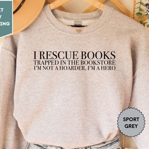 I Rescue Books Trapped In The Bookstore I'm Not A Hoarder I'm A Hero Sweatshirt, Funny Book Sweatshirt, Librarian Sweatshirt,Book Lover Gift