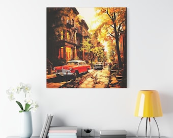May include: A vintage red car drives down a city street lined with brownstone buildings. The street is lined with trees with yellow leaves. The sun shines brightly in the sky.