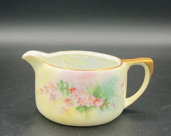 Jarra de porcelana antigua pintada a mano