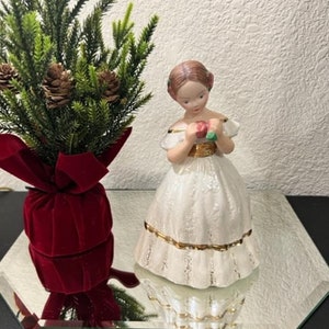 Vintage Ceramic Girl Figurine with Pink Flowers