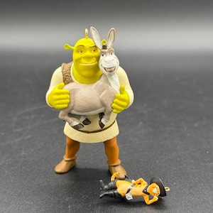 Enfeites Hallmark Keepsake "Shrek, Burro e Gato de Botas"