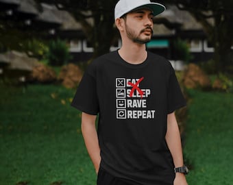 May include: Black t-shirt with a white checklist graphic that says "Eat, Sleep, Rave, Repeat". The word "Sleep" is crossed out with a red X.