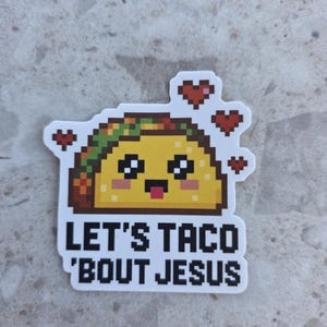 May include: A pixelated sticker featuring a smiling taco with a yellow filling, green and brown toppings, and three red hearts. The text "LET'S TACO 'BOUT JESUS" is below the taco.