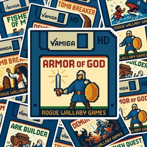 May include: A collection of retro-style stickers featuring pixelated game art. The central sticker displays "Armor of God" with a knight illustration. Other stickers showcase titles like "Tomb Breaker" and "Nineveh Quest", all under the "Rogue Wallaby Games" label.