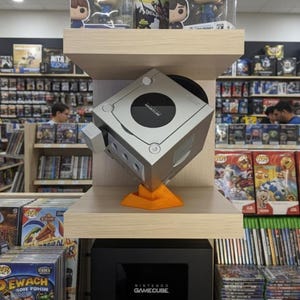 Suporte de exibição do GameCube: sistema de encaixe de canto, policarbonato e náilon