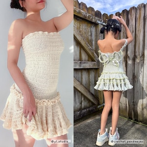 May include: Cream-colored crochet dress with a strapless bodice and ruffled skirt. The dress is handmade, featuring a textured pattern and a playful, feminine design. The image also shows a similar dress with a bow detail on the back.