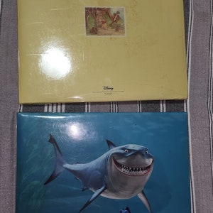 Winnie l'ourson et Nemo Scrapbook ainsi que du matériel de scrapbooking