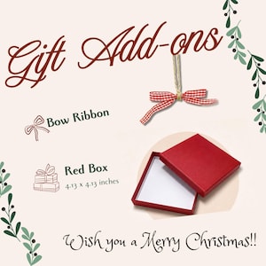 May include: Gift add-ons featuring a red and white gingham bow ribbon with twine and a square red gift box measuring 4.13 x 4.13 inches. The text reads Gift Add-ons, Bow Ribbon, Red Box, and Wish you a Merry Christmas!! with green leaf accents.