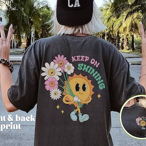 Continua a splendere T-shirt retrò dei cartoni animati, T-shirt con stampa fumetti vintage degli anni '70, Top Boho Festival oversize, T-shirt tascabile estiva a colori confortevoli