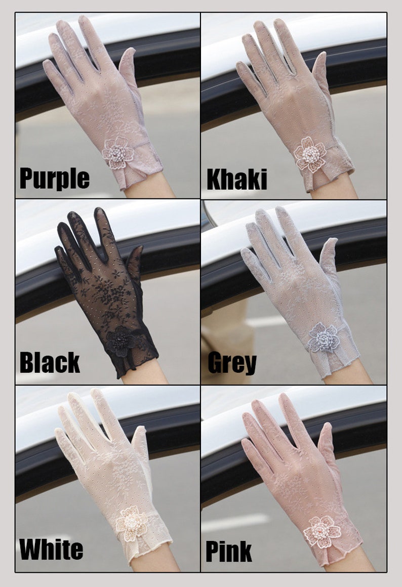 May include: Six pairs of sheer lace gloves with a floral embellishment on the wrist. The gloves are in the colors purple, khaki, black, grey, white, and pink.