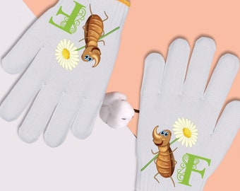 May include: Two white cotton dishwashing gloves with a yellow trim. Each glove features a cartoon illustration of a bug holding a flower. The first glove has the letter "F" and the second glove has the letter "F".