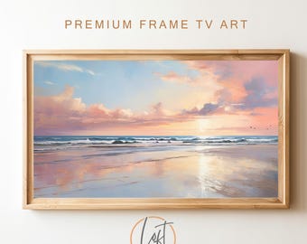 May include: A framed painting of a beach scene with a pink and orange sunset over the ocean. The water is calm and reflects the colors of the sky. The sand is white and there are a few rocks in the foreground.