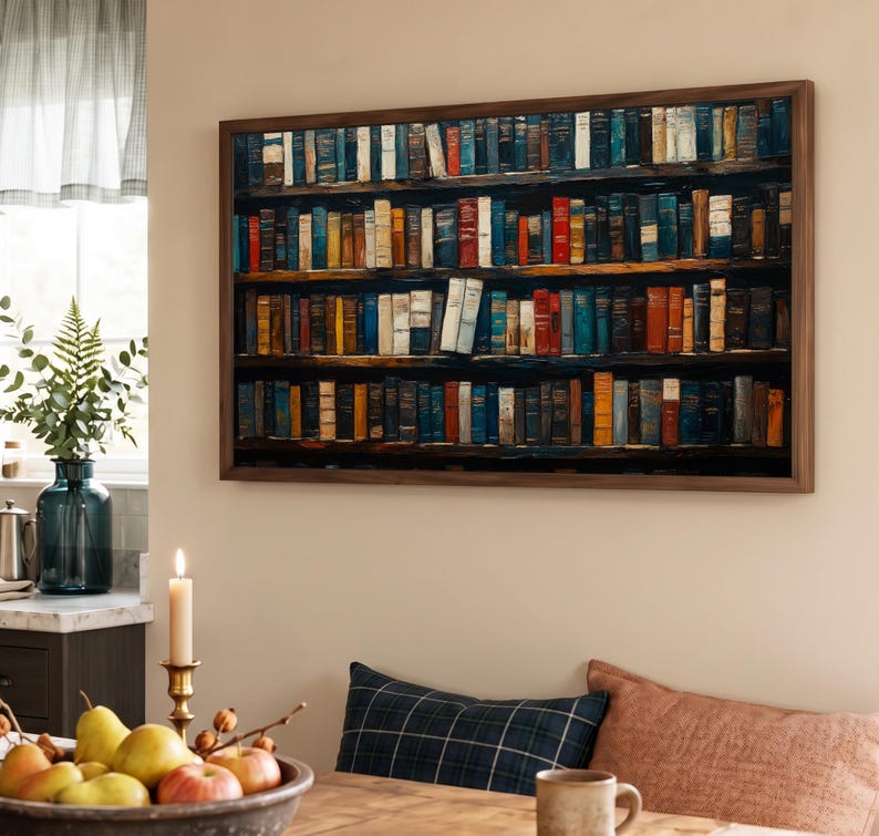 May include: A rectangular wall art piece featuring a detailed print of a multi-tiered wooden bookshelf filled with numerous books in various colors including blue, red, yellow, and white, all enclosed within a dark brown wooden frame.