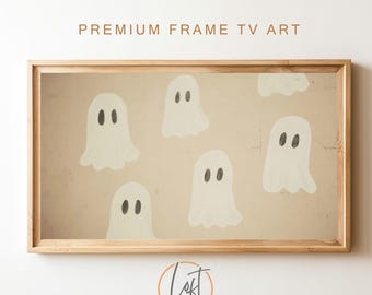 May include: A framed print with a beige background and multiple white ghost illustrations with black eyes. The frame is made of light wood.