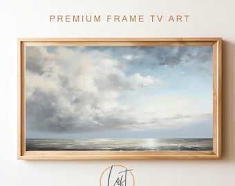 May include: A framed painting of a seascape with a cloudy sky and a calm ocean. The painting is in a light wood frame and has a subtle, muted color palette.