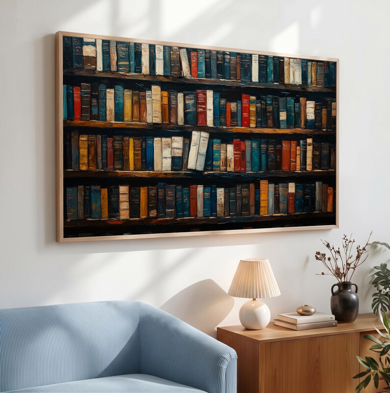 May include: A rectangular wall art print featuring a detailed illustration of a multi-tiered wooden bookshelf packed with numerous vintage books in various colors, including shades of blue, red, yellow, and brown, framed in a light wood border.