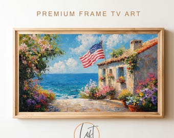May include: A framed painting of a white house with a red, white, and blue American flag waving in the wind. The house is surrounded by lush green trees and flowers, and the ocean is visible in the background.