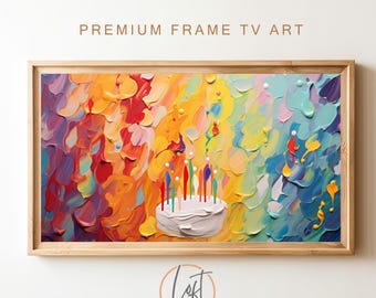 May include: A colorful abstract painting with a white cake with lit candles in the center. The background is a mix of yellow, orange, red, blue, and purple.