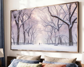 May include: A rectangular wall art print featuring a snowy park scene with bare trees, a snow-covered path, a black metal fence, and a lone figure walking in the distance, all enclosed within a thin, dark brown wooden frame.
