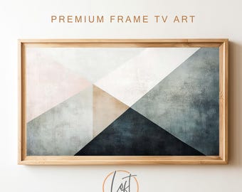May include: Abstract geometric art print in shades of blue, gray, pink, and brown. The print is framed in a natural wood frame.
