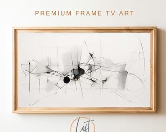 May include: Abstract black and white art print in a wooden frame. The print features a series of lines and shapes that create a sense of movement and energy.