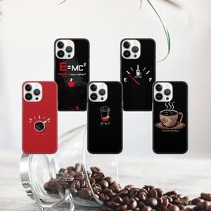 May include: Five different iPhone cases with coffee-themed designs. The cases are black and red with white text and graphics. The designs include a coffee cup, a coffee gauge, and the text "E=MC2 Energy + Milk Coffee".