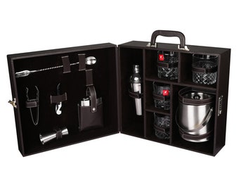 May include: A brown leather bar set with a cocktail shaker, ice bucket, glasses, and bar tools. The set is in a carrying case with a handle.