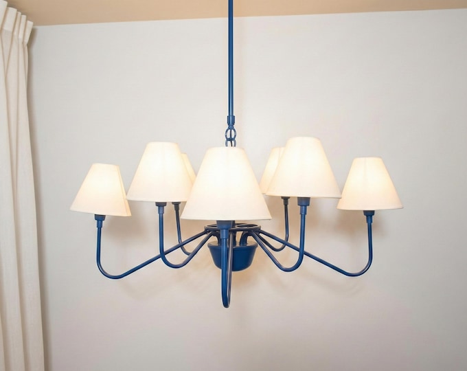 The Blue Chandelier Light redefines sophistication with bold contemporary charm.