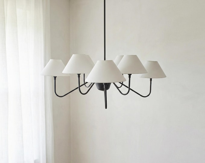 Embrace exquisite lighting craftsmanship in the timeless allure of Matte Black.