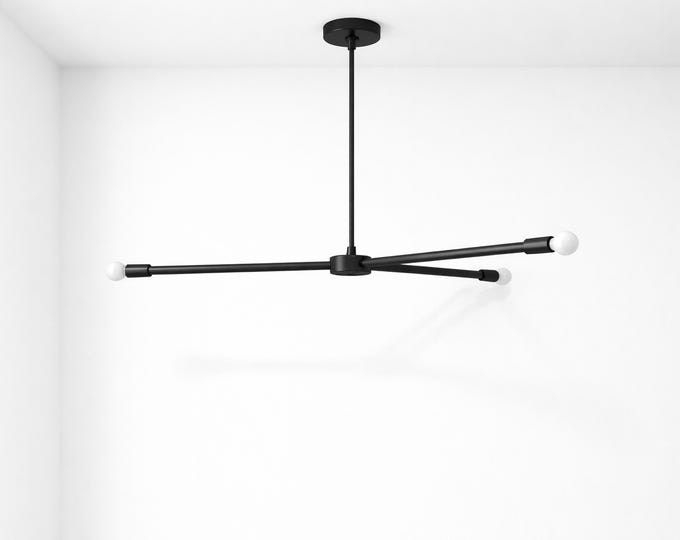 Modern Geometric Y-Shape Pendant – Stresses the bold, sculptural form ideal for luxury interior